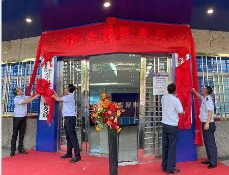万宁市税务局举行新办公场所揭牌仪式